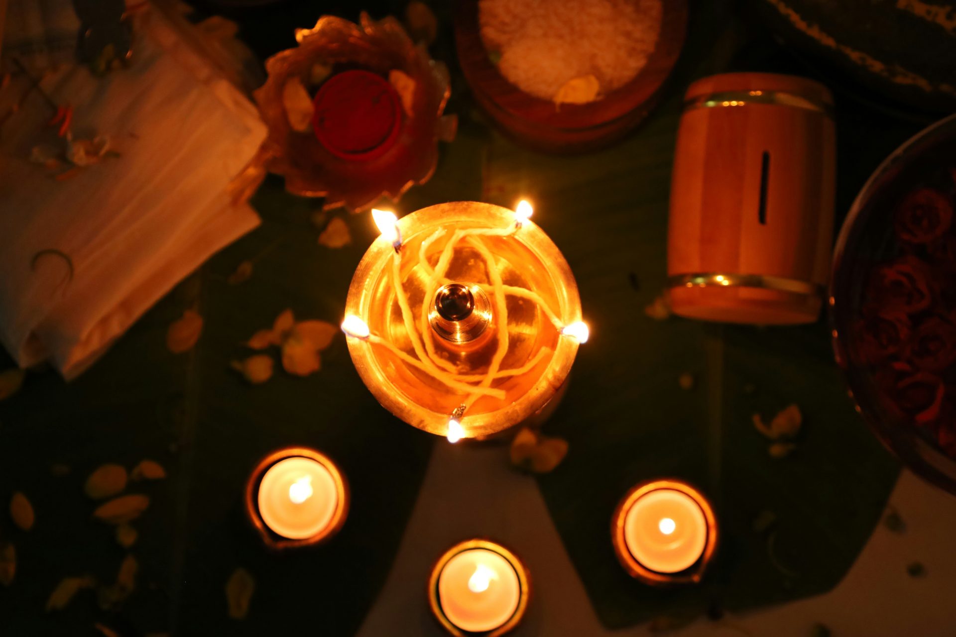 a group of candles sitting on top of a table